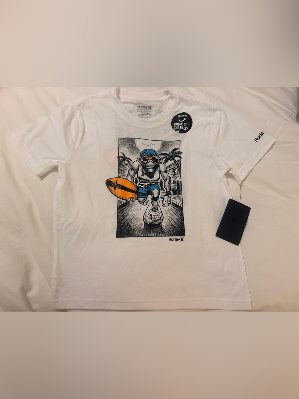 Boys size 7 Hurley White Tee with Orange Surfboard and Blue Accents